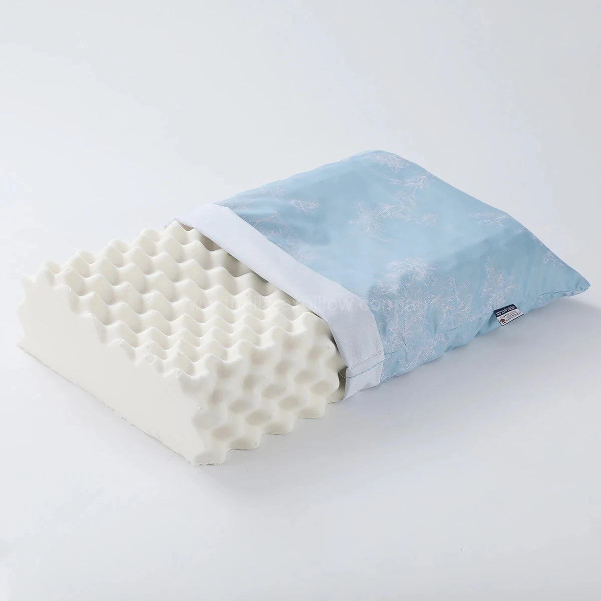 Half-covered view of the pillow - ROYAL Latex Neck Pillow Contour Support with Massage Nodules
